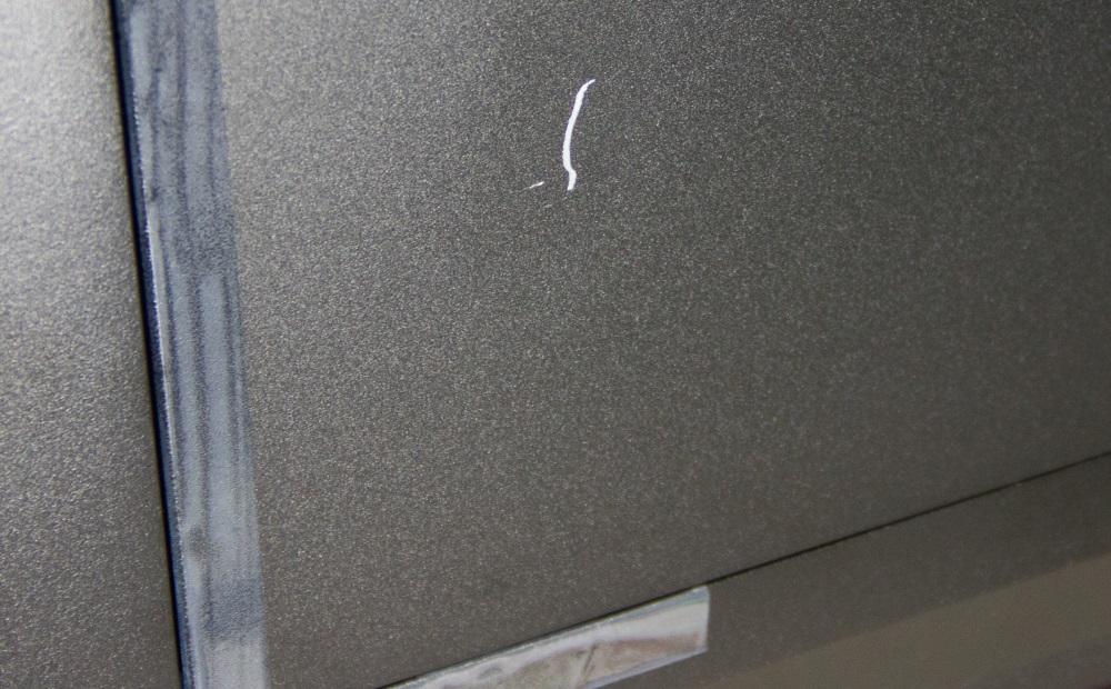 Scratch in side panel of case